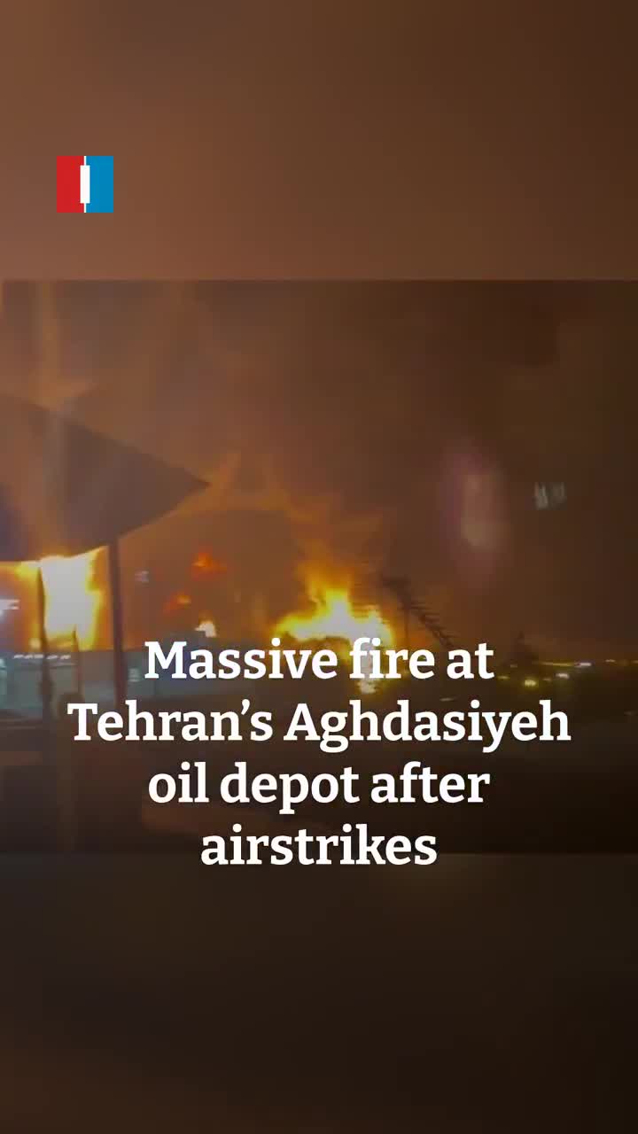 A massive fire is seen burning at Tehran’s Aghdasiyeh oil depot after airstrikes late on Saturday, footage sent to Iran International shows